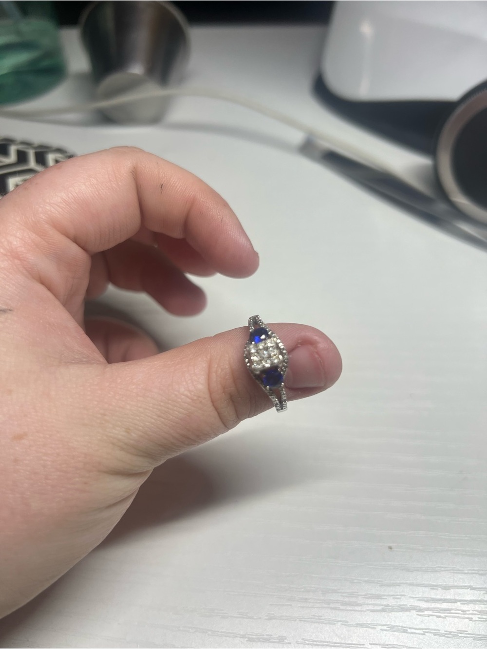 Two sapphire diamonds with a diamond on top sz 8.5